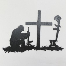 Soldier Kneeling at Cross